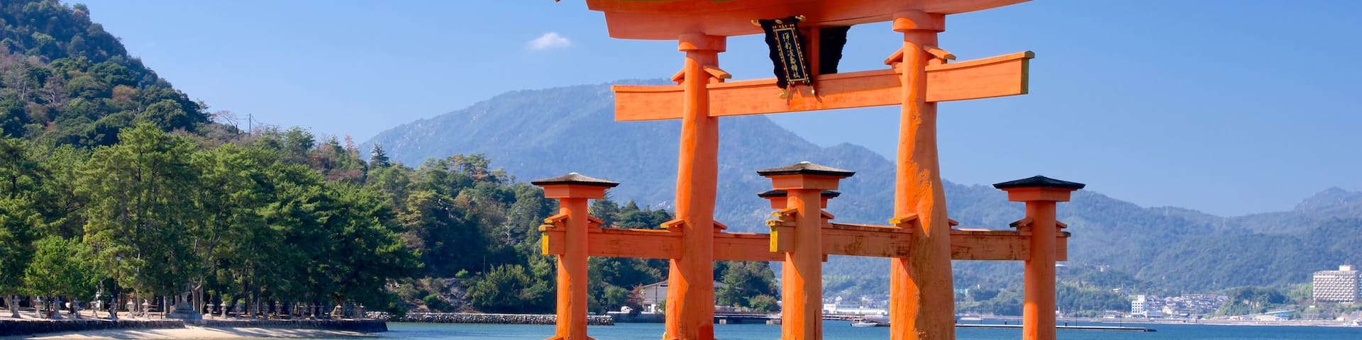 Itsukushima Shrine featuring a lake or waterhole and heritage elements