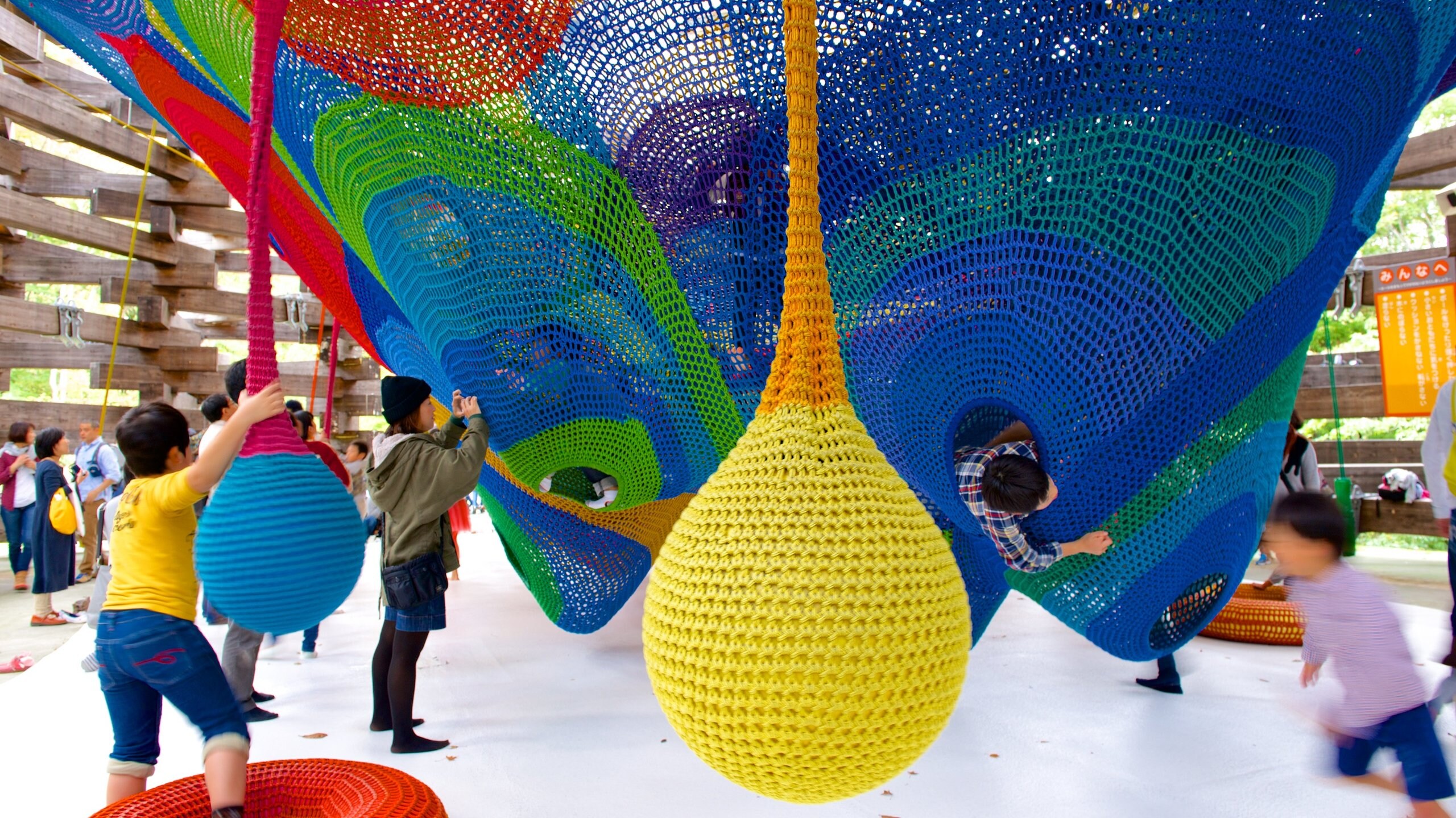 Hakone Open Air Museum featuring outdoor art and a playground as well as children