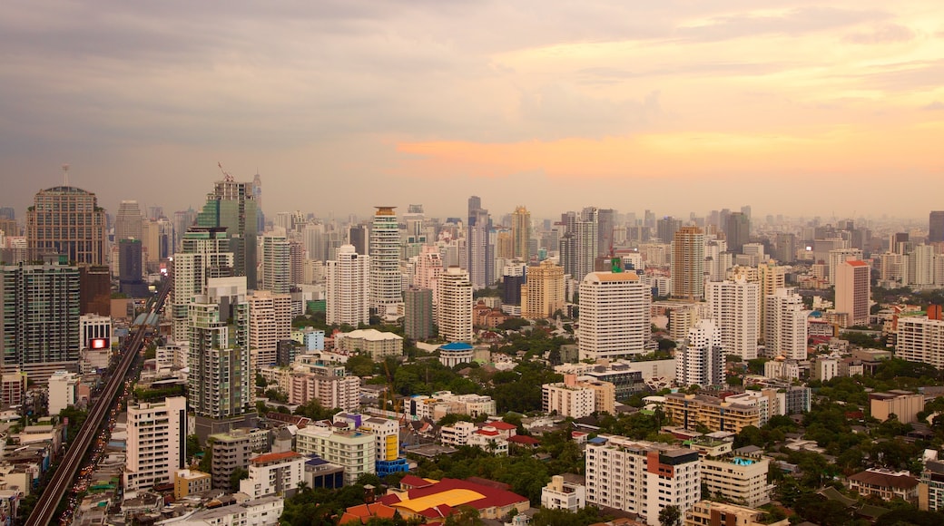 Sukhumvit which includes a sunset and a city