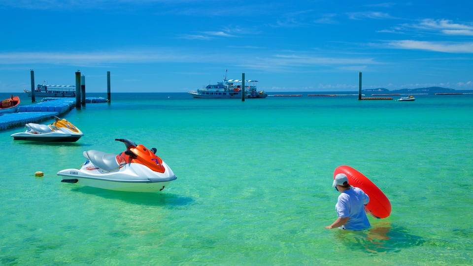 Samae Beach showing jet skiing and general coastal views as well as an individual femail