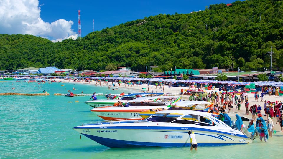 Ta-Yai Beach showing boating and a beach as well as a large group of people