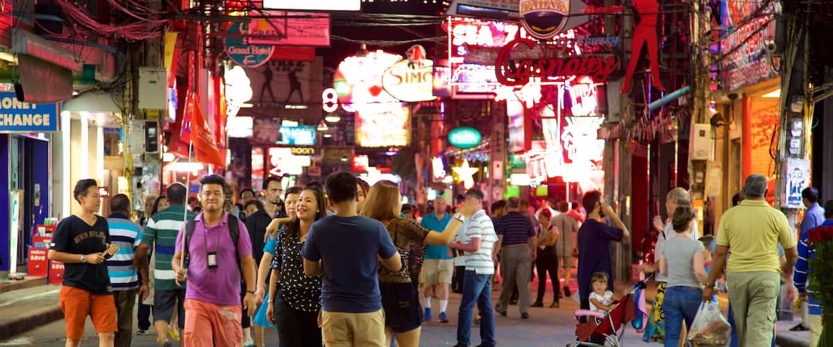 Walking Street featuring night scenes and markets as well as a large group of people