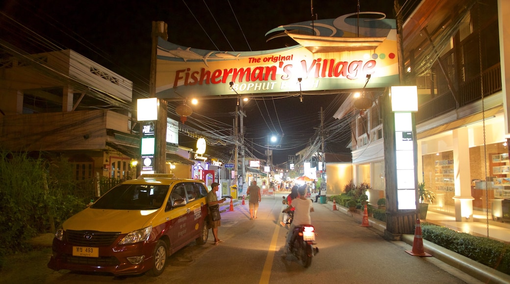 Ciudad de los Pescadores que incluye escenas nocturnas