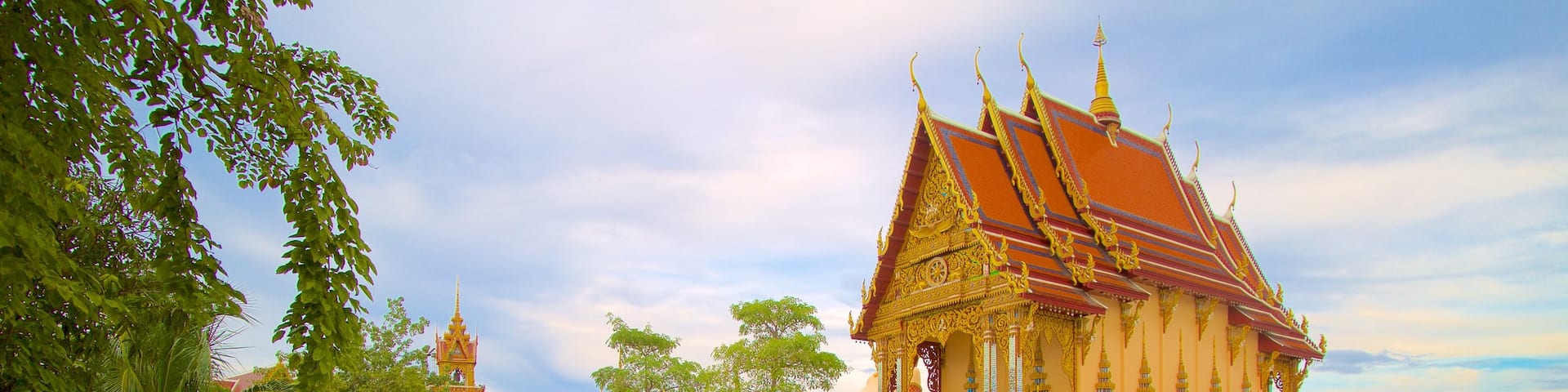 Wat Plai Laem which includes a temple or place of worship