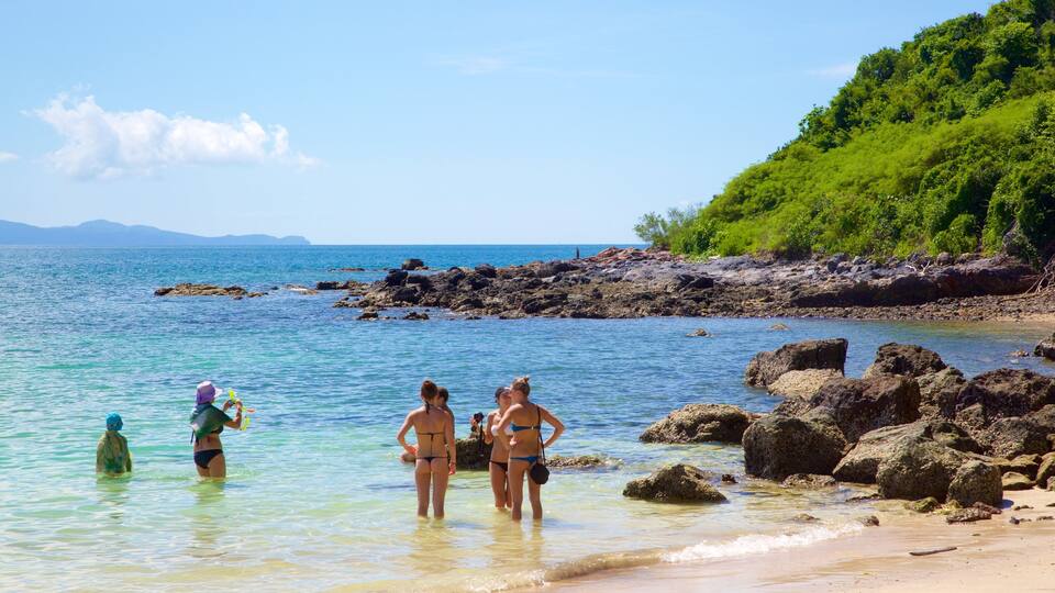 Nual Beach featuring swimming, rocky coastline and general coastal views