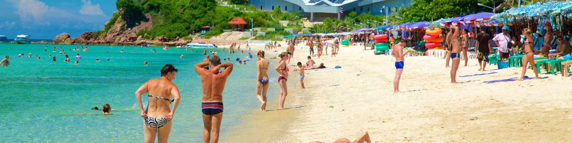Samae Beach showing a beach as well as a large group of people