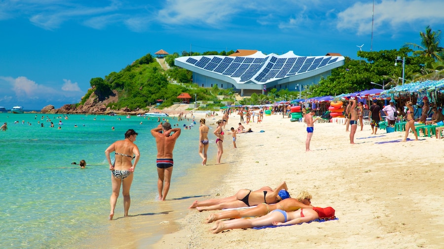 Samae Beach which includes a sandy beach as well as a large group of people