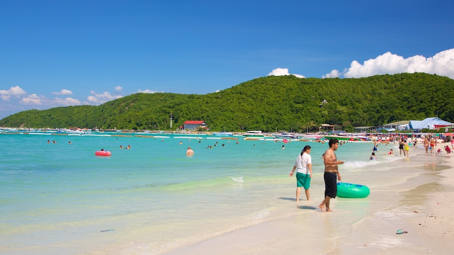 Ta-Yai Beach showing a sandy beach as well as an individual male
