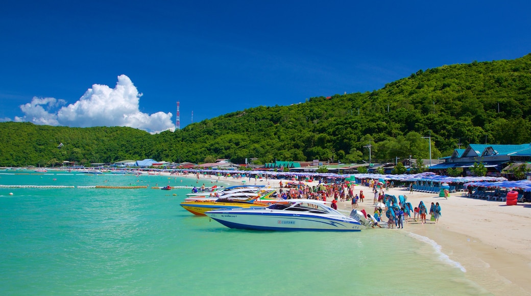 Ta-Yai Beach featuring boating and a sandy beach as well as a large group of people