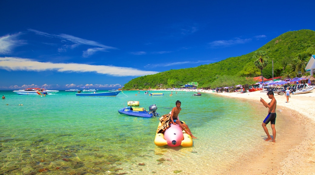 Koh Lan featuring boating and general coastal views as well as children