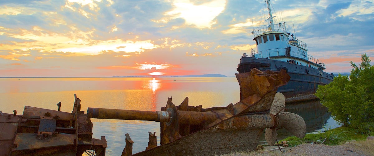 Kingston featuring general coastal views, heritage elements and a sunset