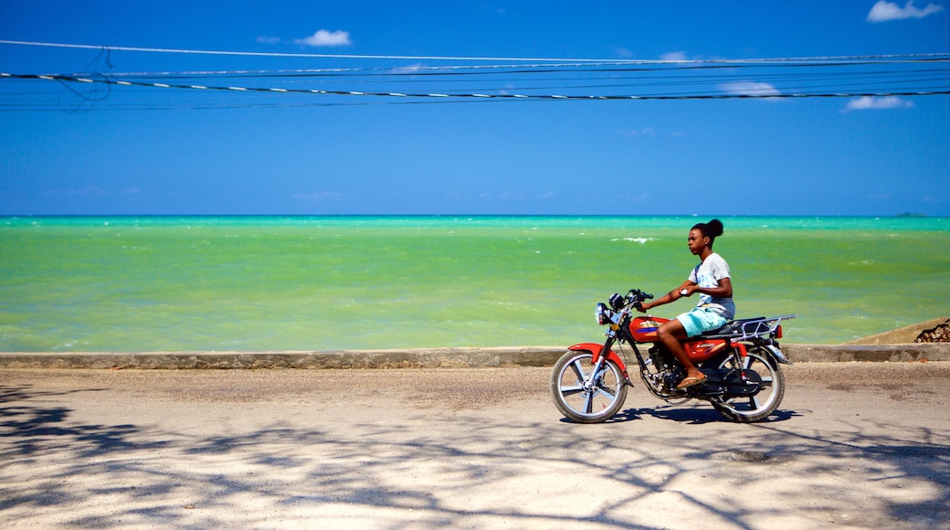 West End featuring motorcycle riding and general coastal views as well as an individual male