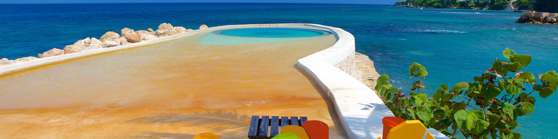 Boscobel showing general coastal views, a pool and a luxury hotel or resort