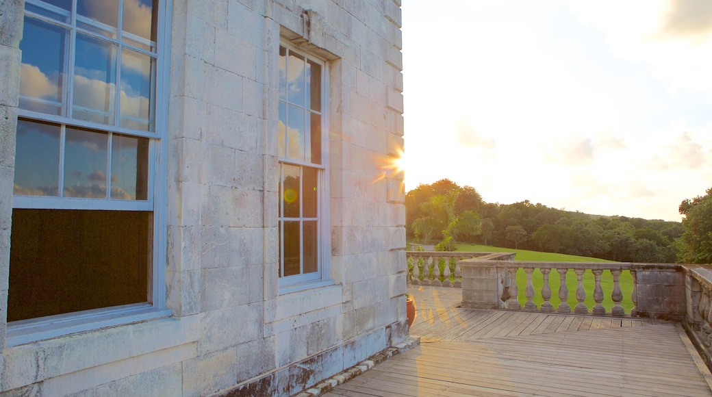 Rose Hall Great House featuring a sunset and a house