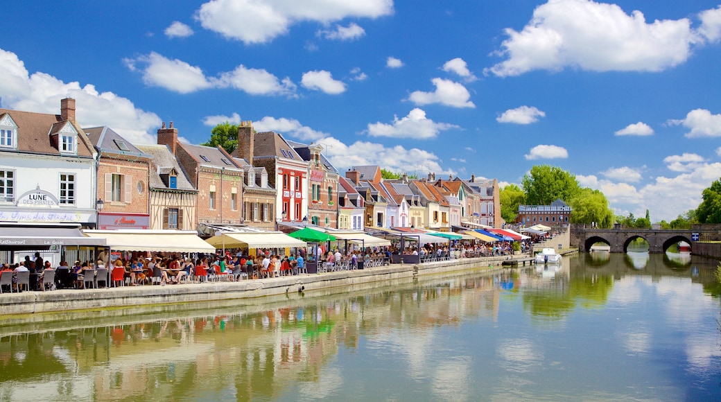 France showing a river or creek, a bridge and heritage architecture