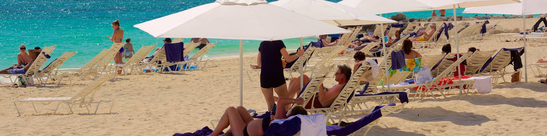 Lucaya Beach which includes general coastal views, a luxury hotel or resort and a beach