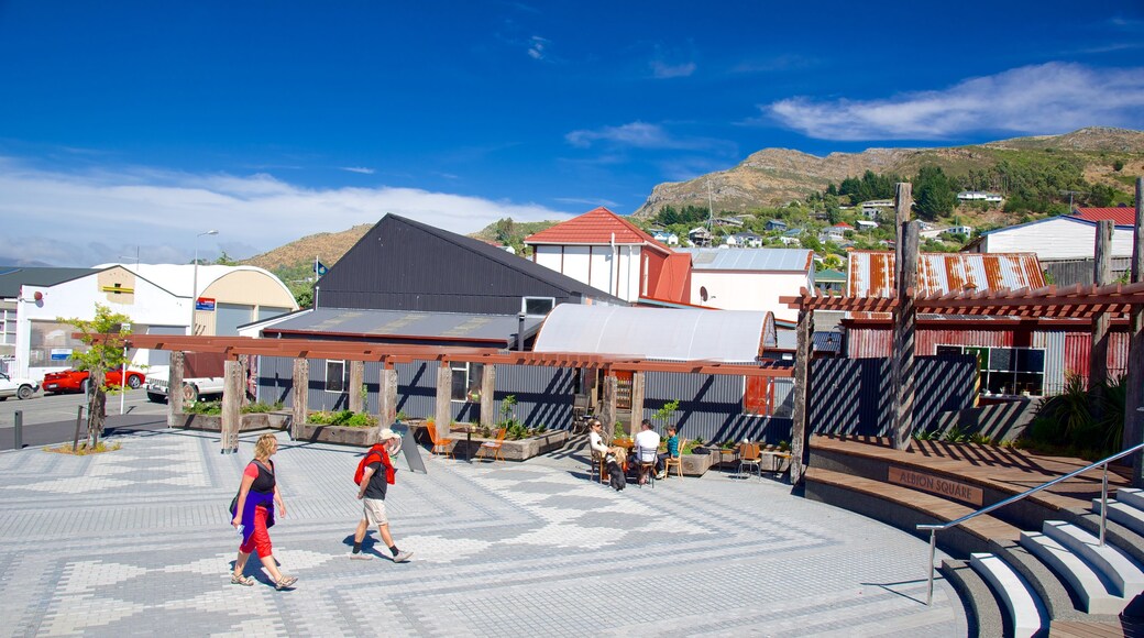 Lyttelton which includes a square or plaza as well as a small group of people