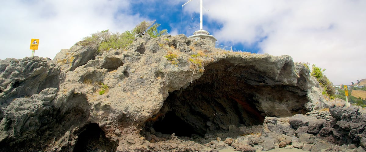 Cave Rock featuring caves