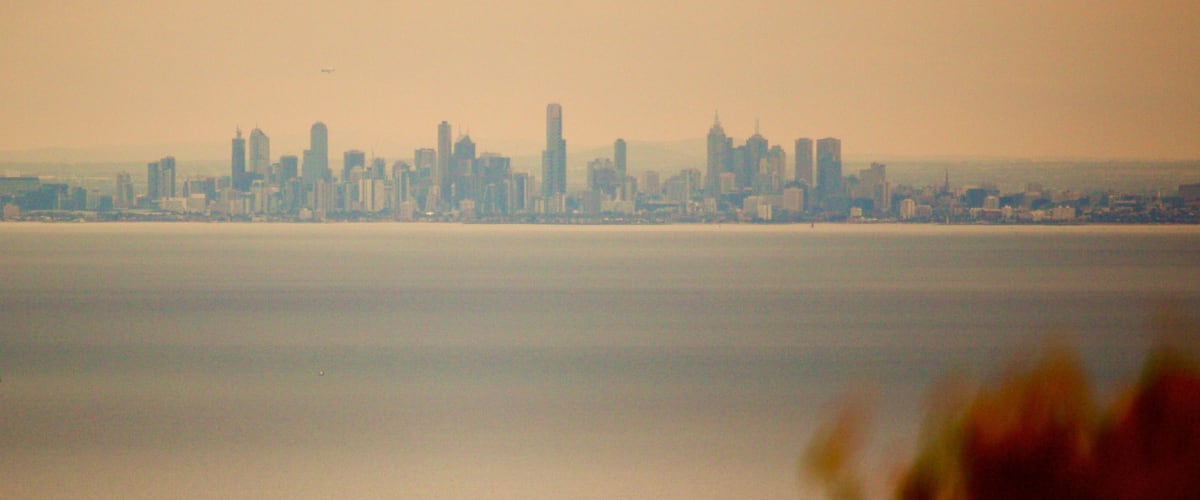 Melbourne showing a sunset, skyline and a city
