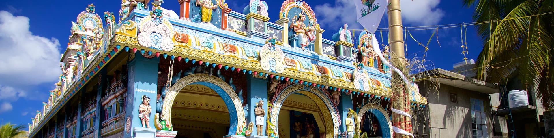 Grand Bay which includes a temple or place of worship and religious aspects