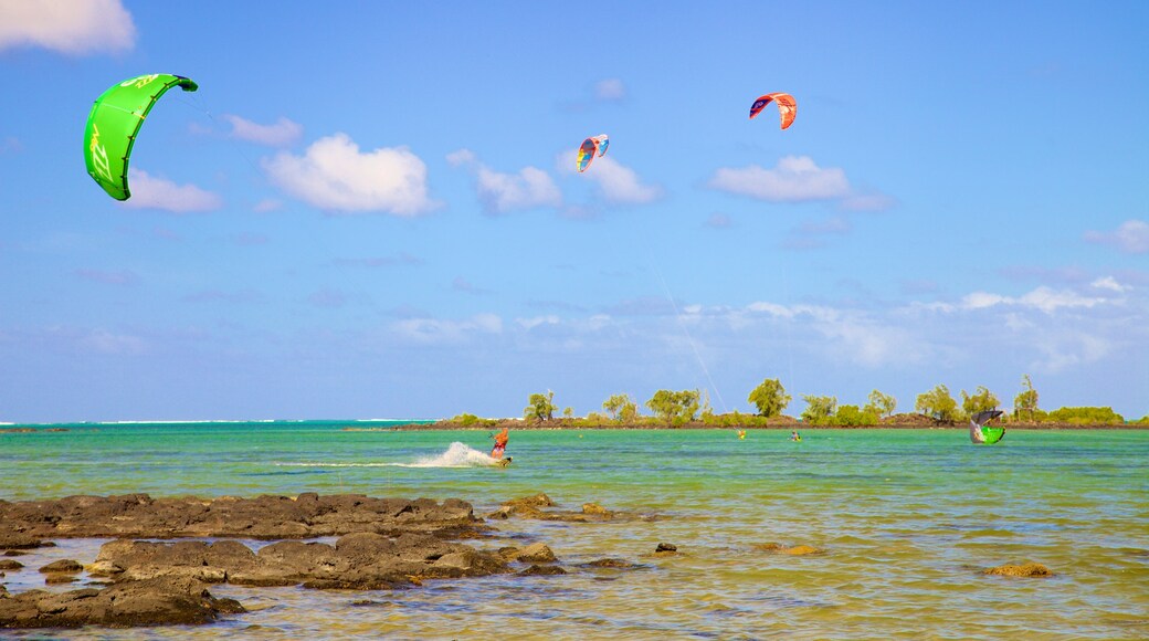 Cap Malheureux featuring general coastal views, rugged coastline and kite surfing