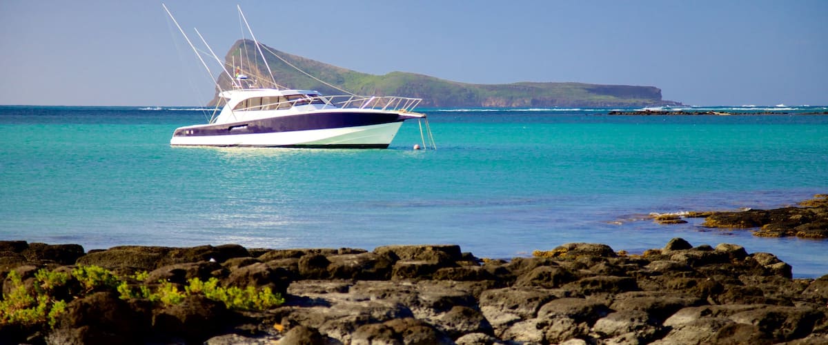 Cap Malheureux which includes boating and rocky coastline