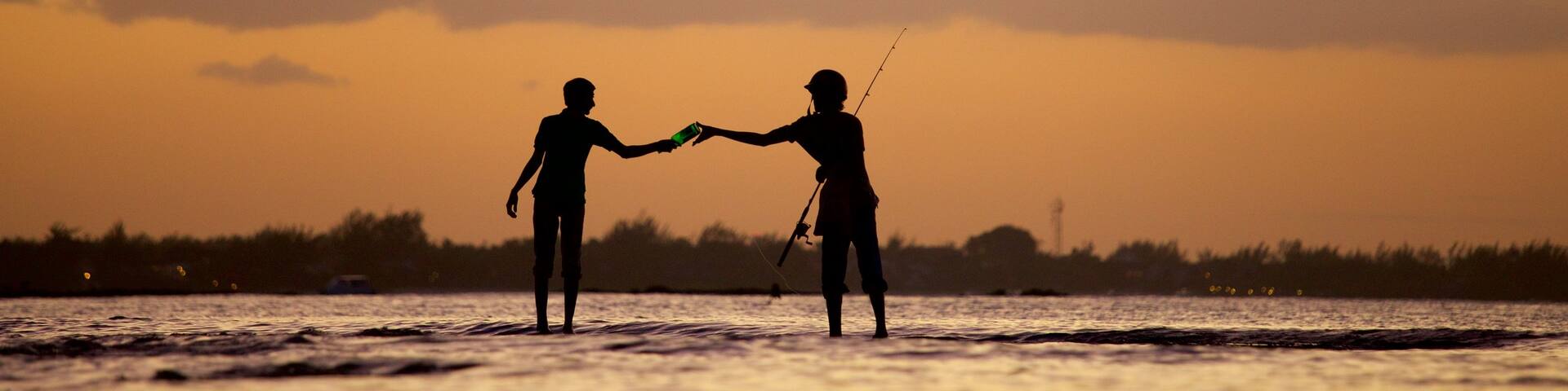 Ăle Maurice montrant coucher de soleil, pĂȘche et vues littorales