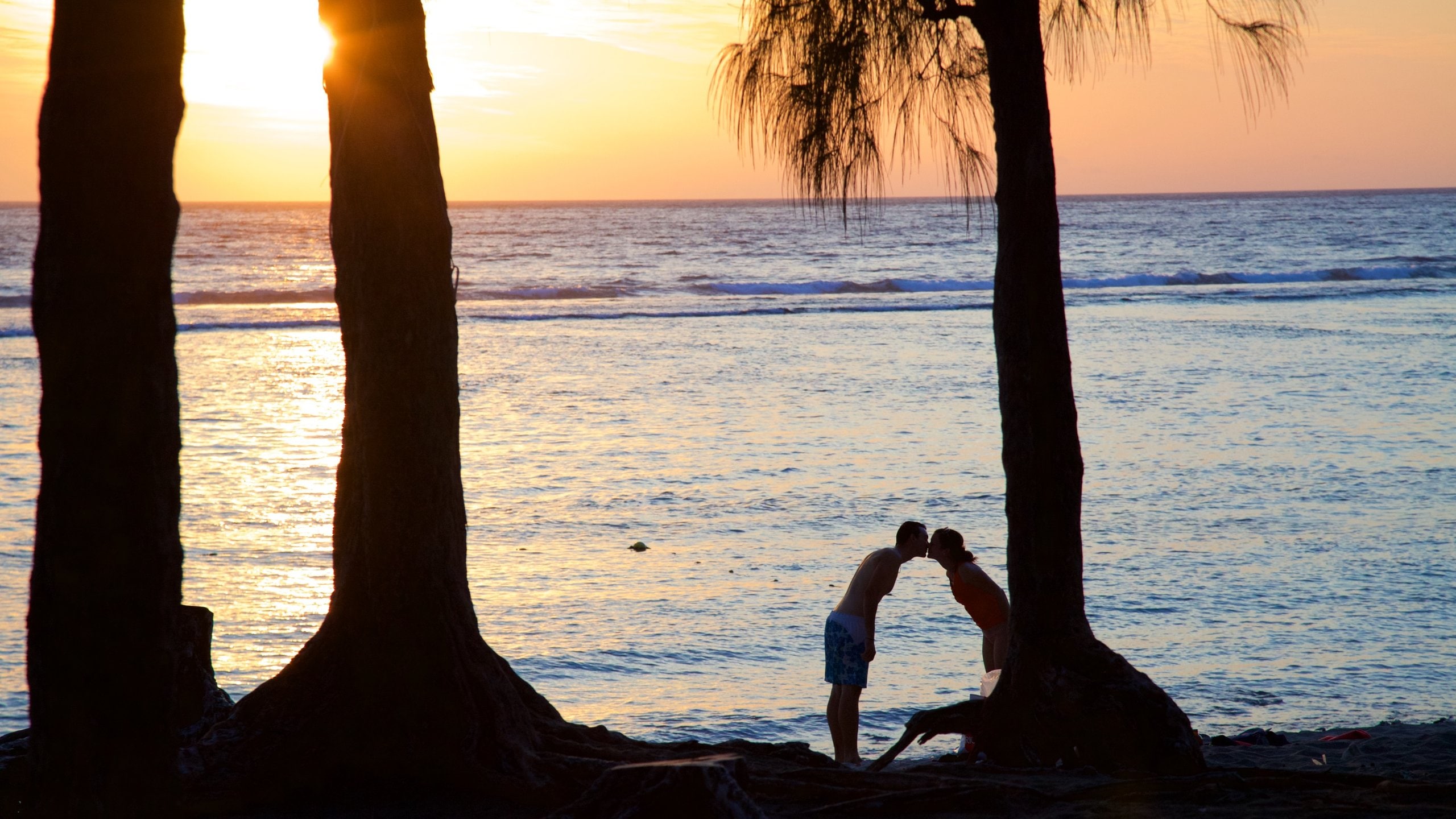 La Saline Les Bains showing a sunset and general coastal views as well as a couple