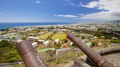 Saint-Denis showing military items, a city and general coastal views