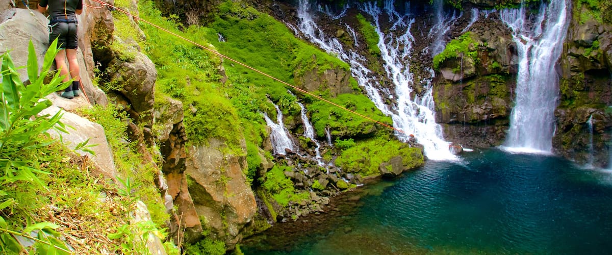 Grand Galet Falls showing a lake or waterhole, a waterfall and zip lining