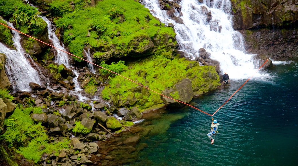 Grand Galet Falls showing a cascade, a lake or waterhole and zip lining