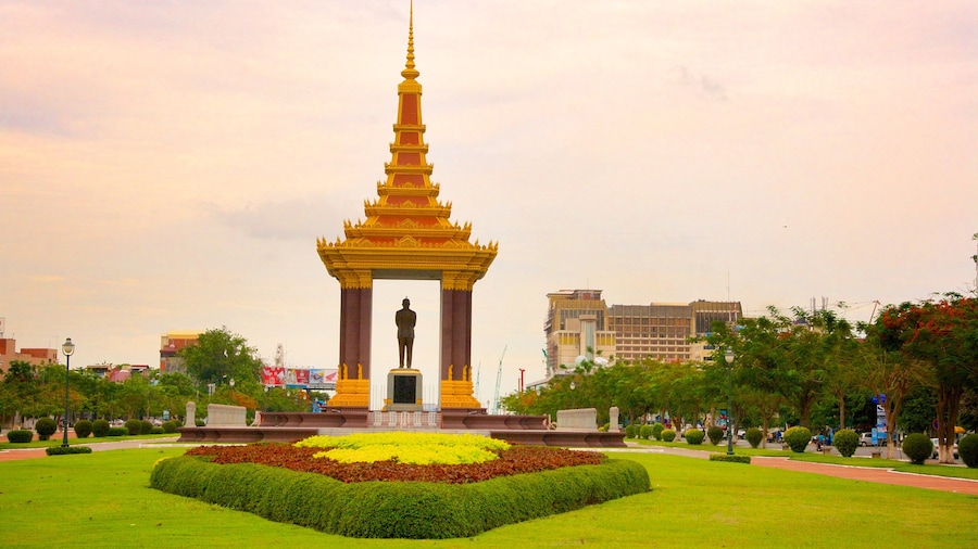 Independence Monument featuring a monument and a garden