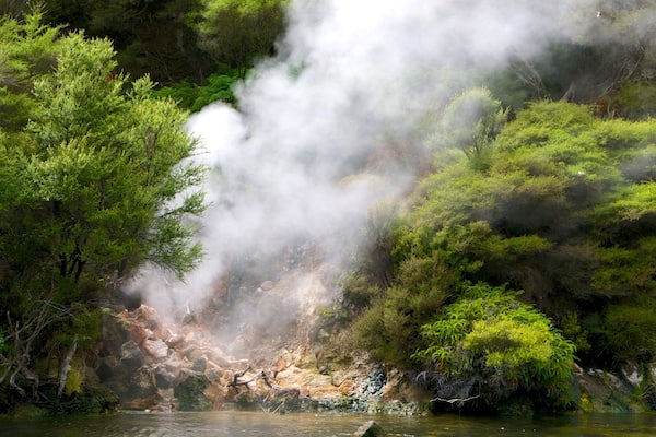 Orakei Korako Geothermal Park and Cave showing mist or fog and a river or creek