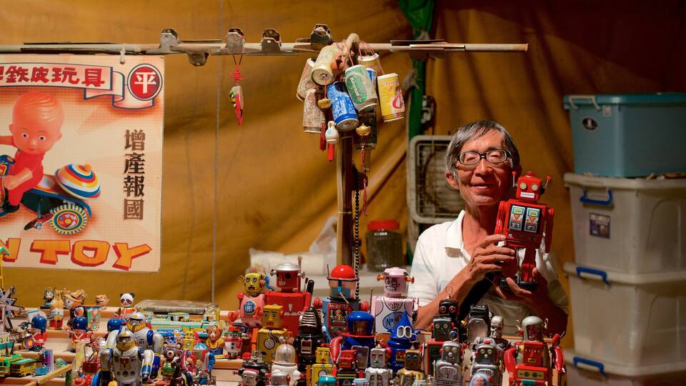 Tainan featuring markets as well as an individual male