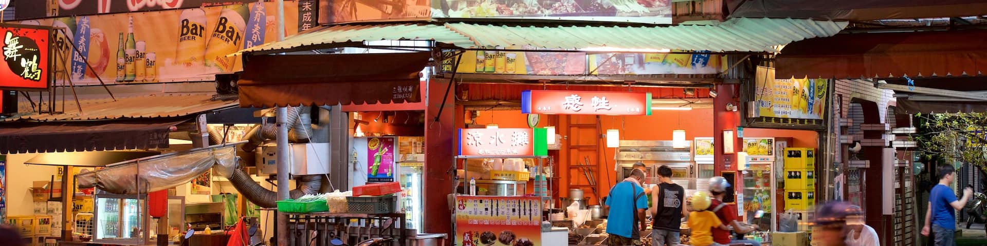 Tainan which includes signage and street scenes