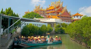 Taijiang National Park which includes a ferry, a river or creek and a temple or place of worship