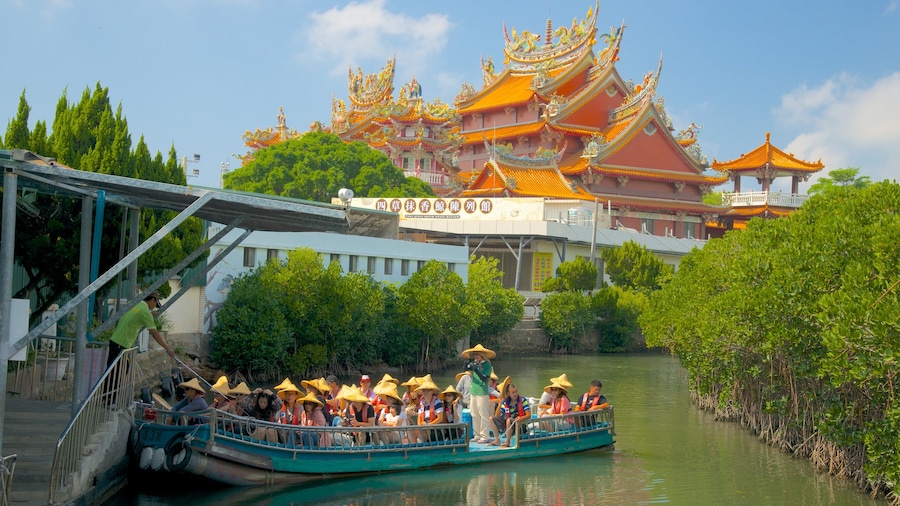 Taijiang National Park which includes a ferry, a river or creek and a temple or place of worship