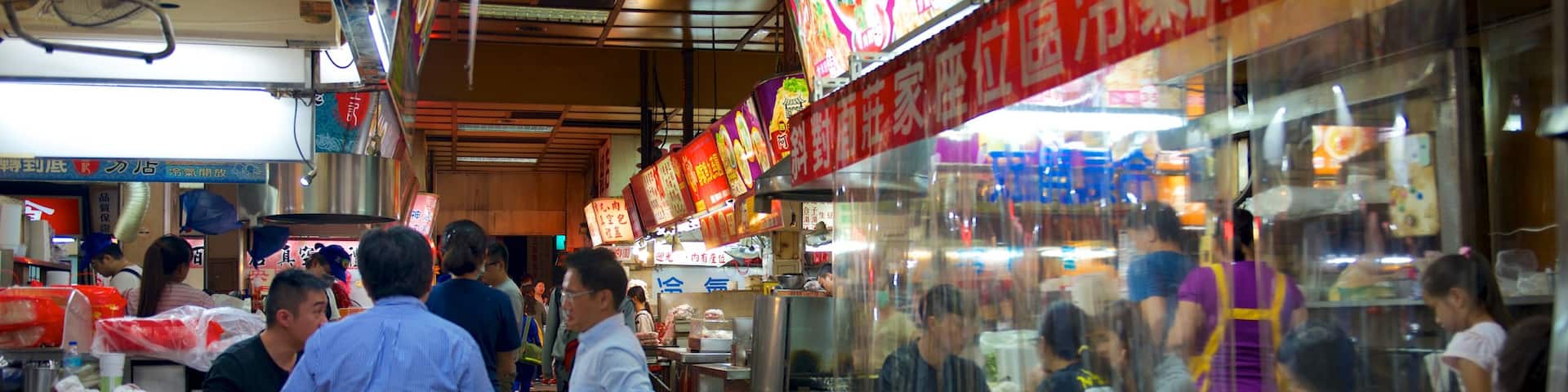 City God Temple showing outdoor eating as well as a small group of people