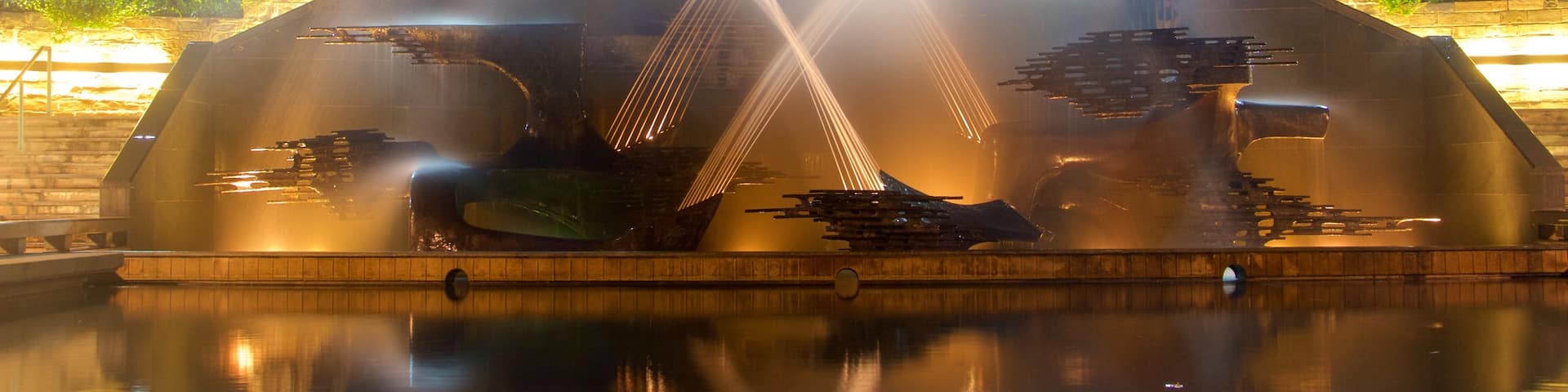 Newcastle showing night scenes and a fountain