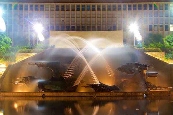 Newcastle which includes night scenes and a fountain