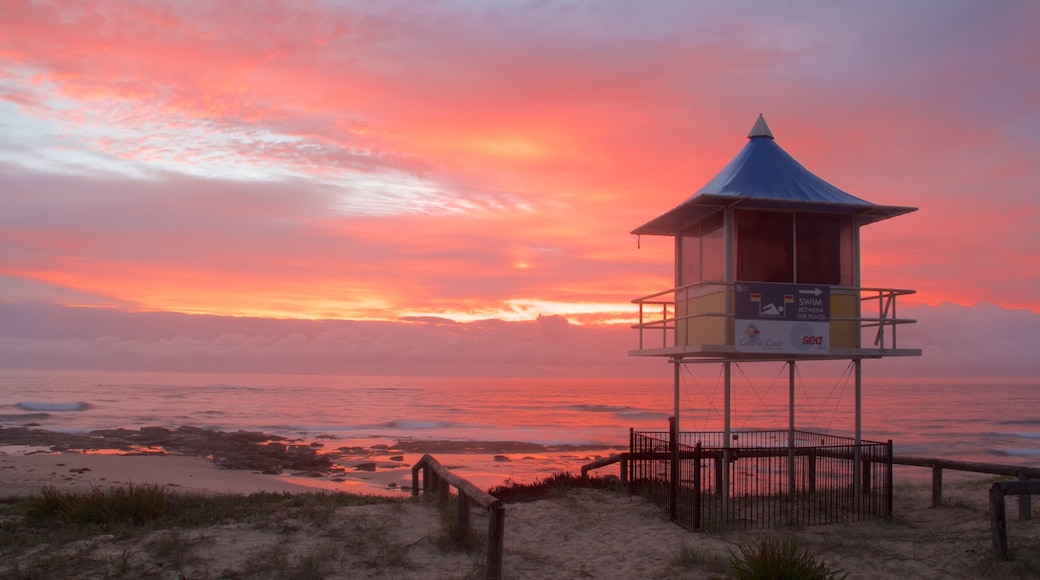 The Entrance featuring a beach and a sunset