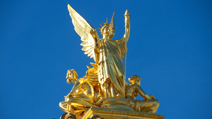 Golden statue detail on Opéra Garnier in Paris, France.