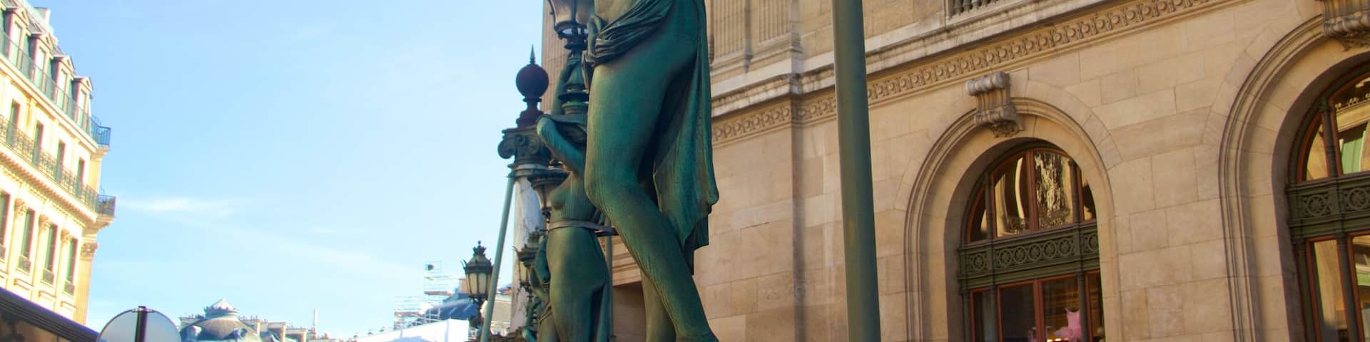 Paris featuring heritage elements and a statue or sculpture