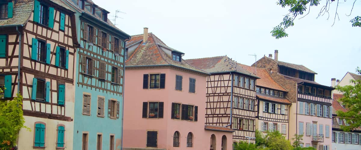 Petite France showing a river or creek and a city