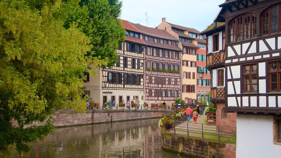 Petite France which includes a river or creek and a city