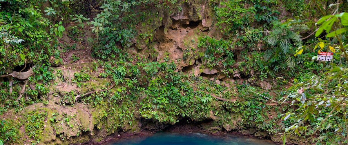 Blue Hole National Park featuring a lake or waterhole, swimming and tranquil scenes