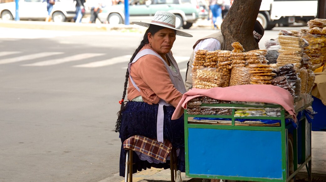 Cochabamba showing markets as well as an individual female