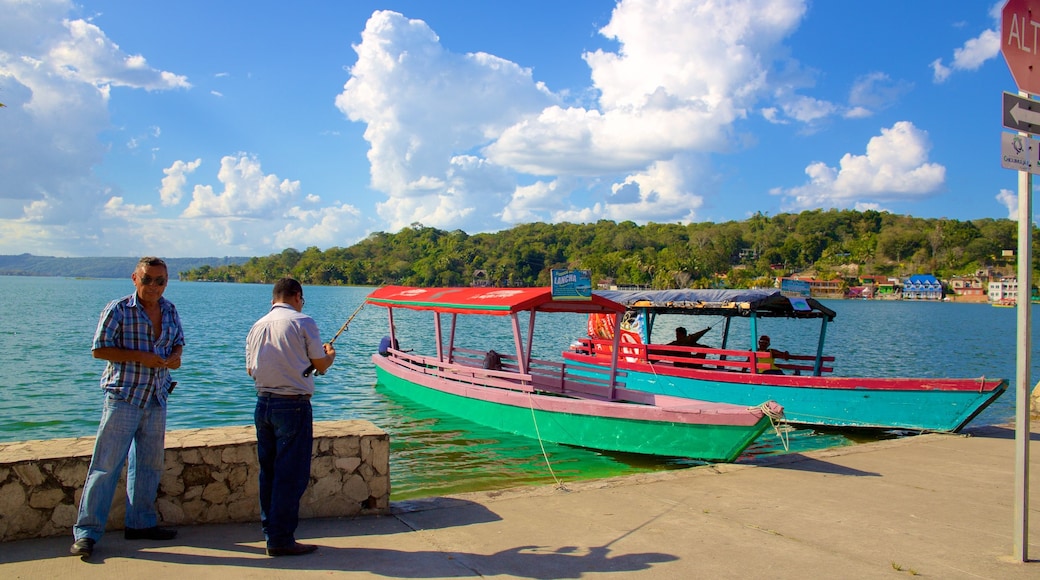 Flores featuring fishing and general coastal views as well as a small group of people