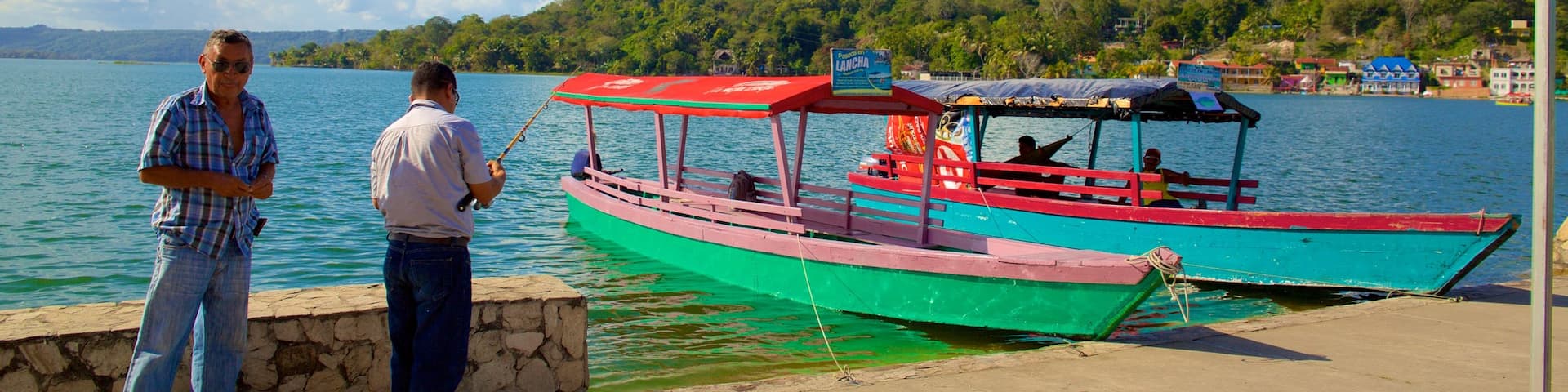 Flores featuring fishing and general coastal views as well as a small group of people