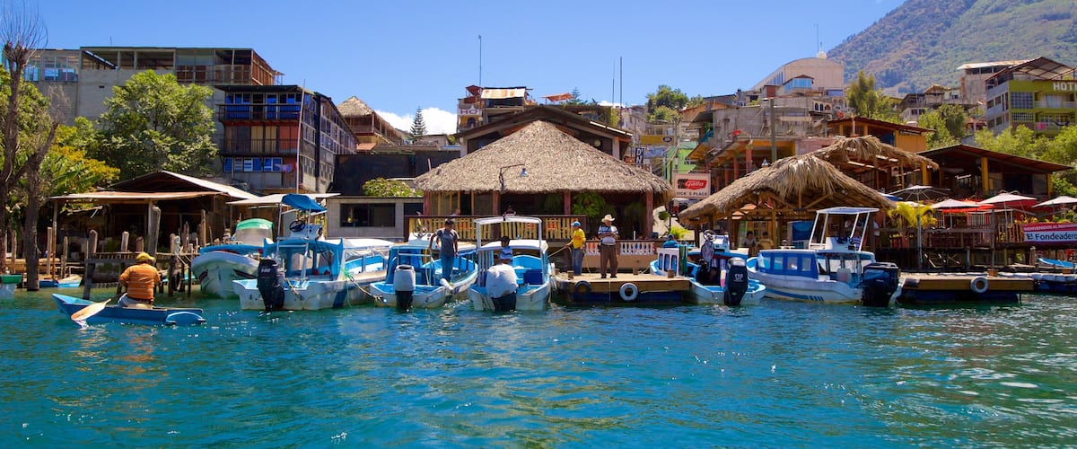 Santiago Atitlan featuring a coastal town and a bay or harbour